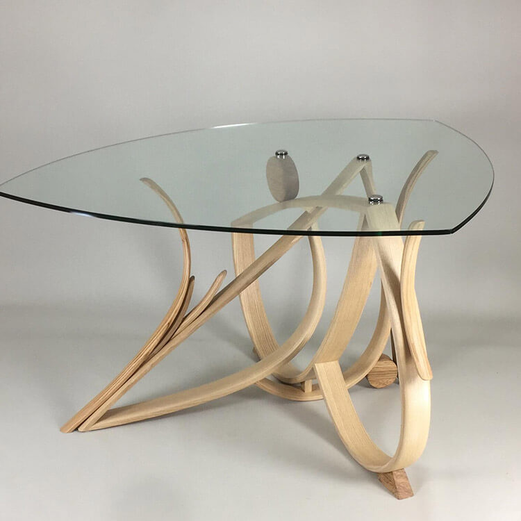 Glass topped table by Philip Koomen