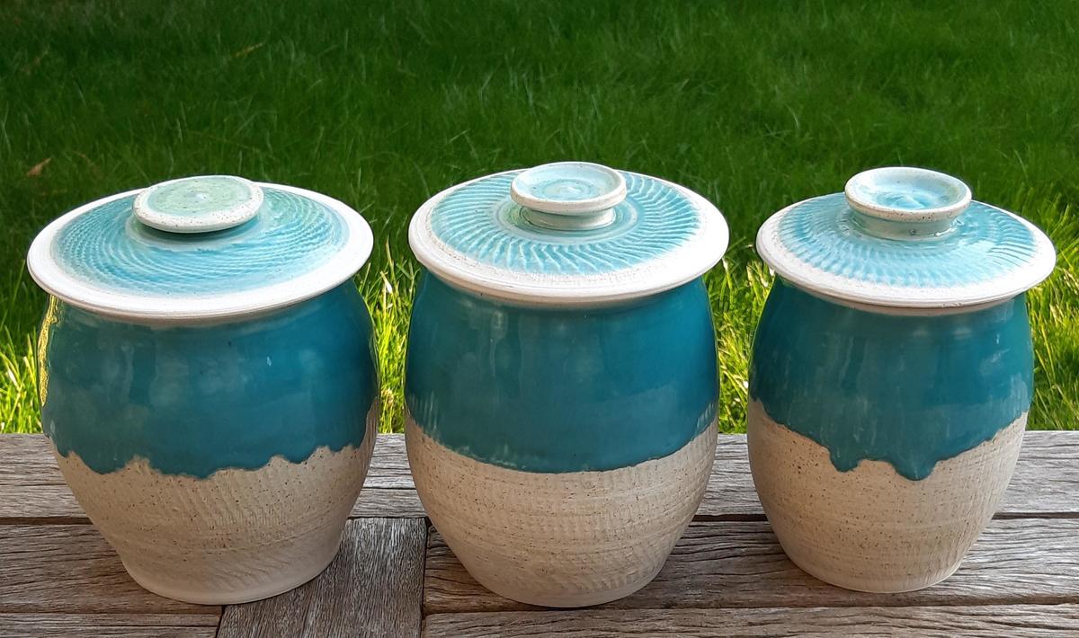 large stoneware storage jars in turquoise glaze