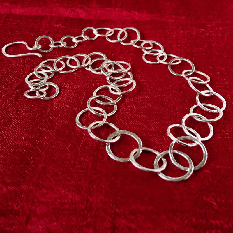 Hammered silver necklace, 47cm long including clasp.