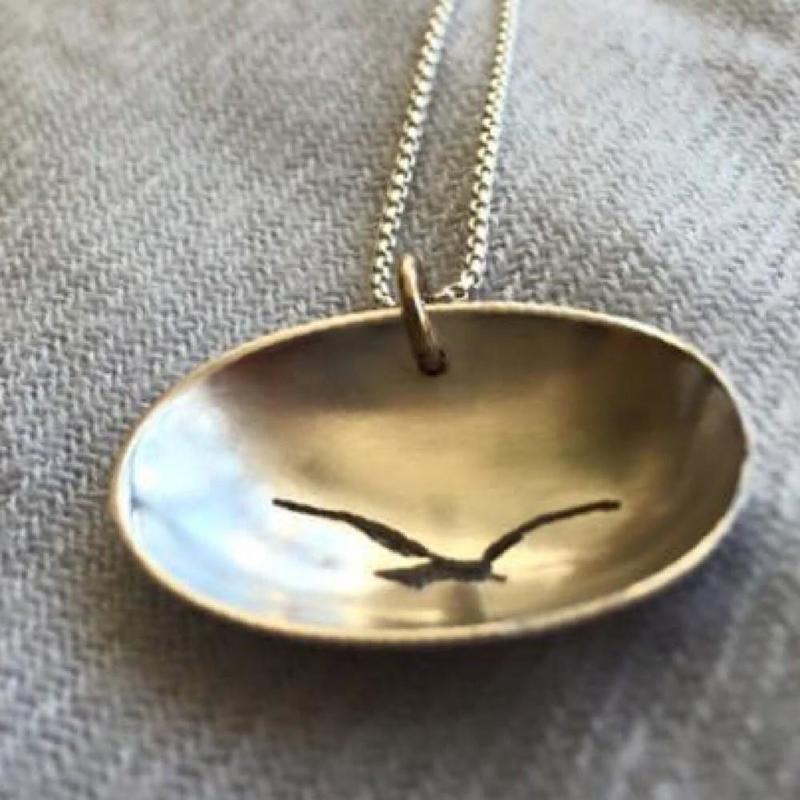 Jonathan pendant, hand fret cut seagull crafted from a 1910 silver coffee spoon bowl.