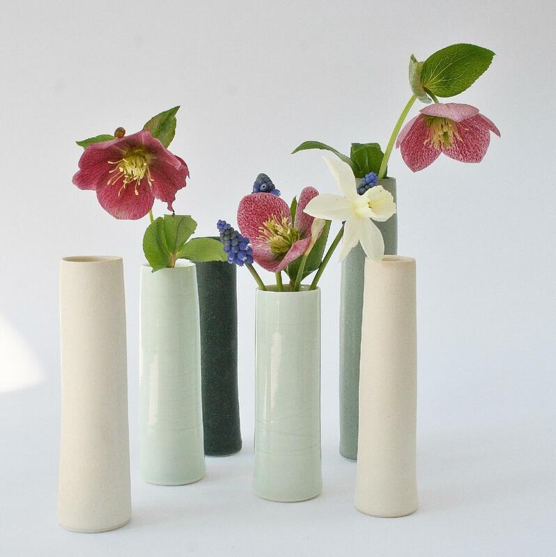 Robyn Hardyman: Porcelain cylinder vases.