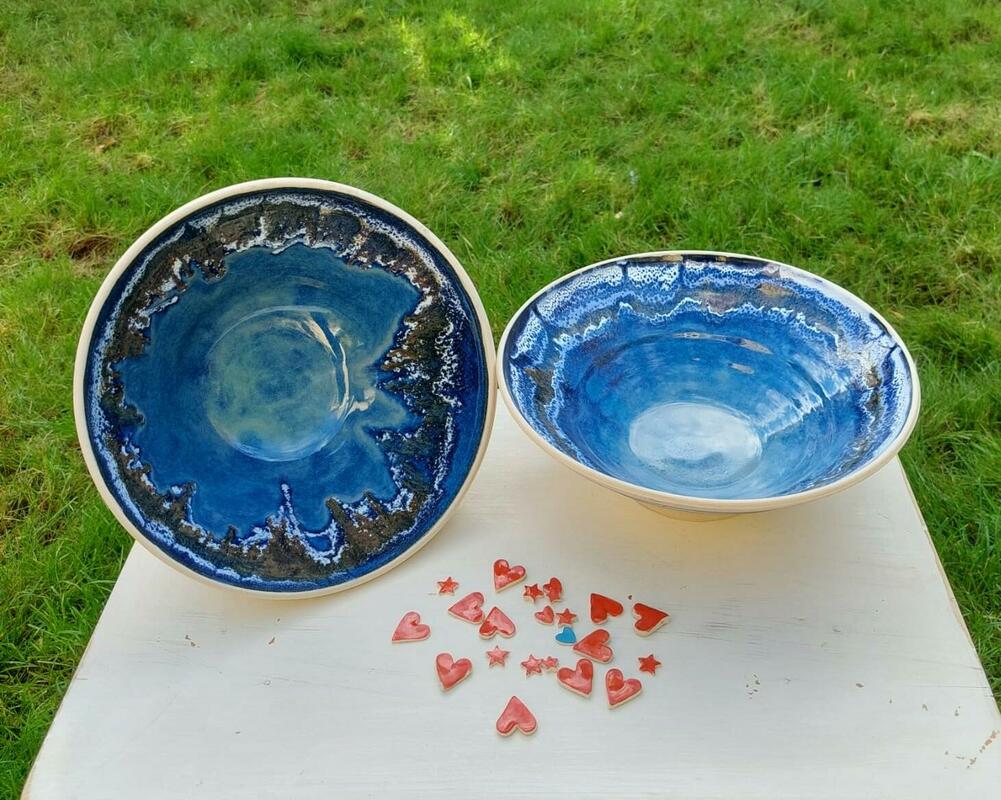 Large bowls reminding you of the deep sea. All purpose functional yet aesthetic also.