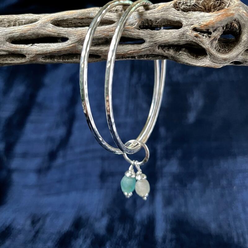 Linked hammered silver bangles with sea glass. Size medium £75