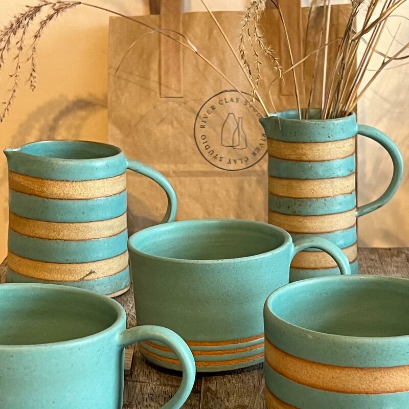 Mugs and jugs in peacock green with stripe detail