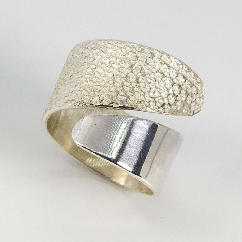wrap over ring with sandstone and bright finish