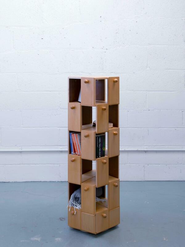 Storage Tower; rotating sculptural storage piece sustainably made through material reuse