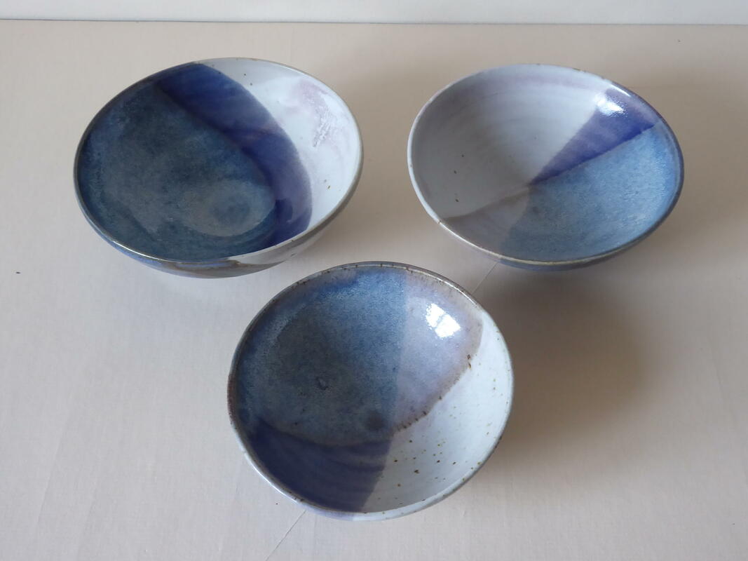 Three blue bowls. Stoneware