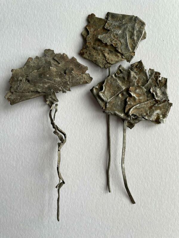 Recycled metal abstract flowers