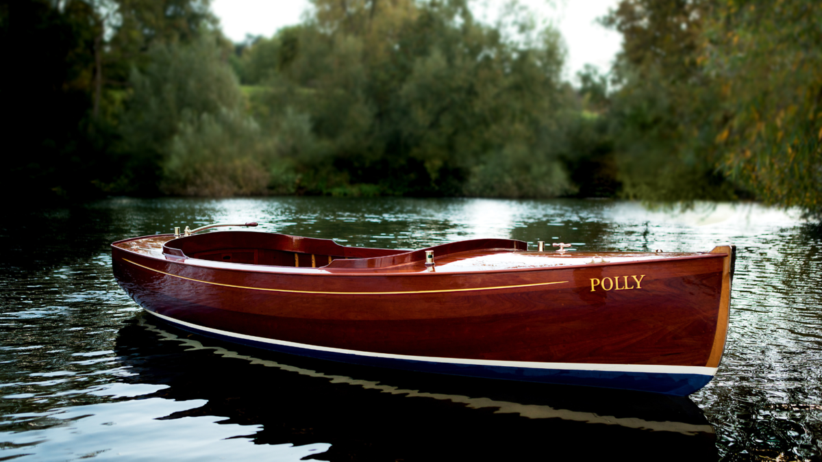 'Polly' - a 13ft electric motor dinghy, designed by Andrew Wolstenholme and built by Colin in 1998. Photograph : Michael English/Tealby Graphics