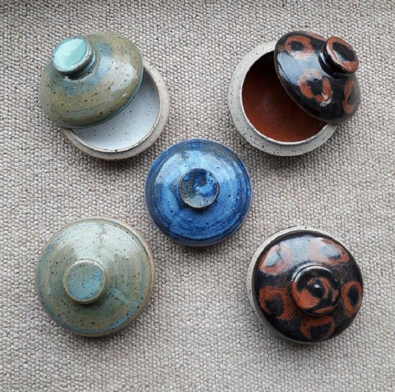 Small stoneware lidded pots