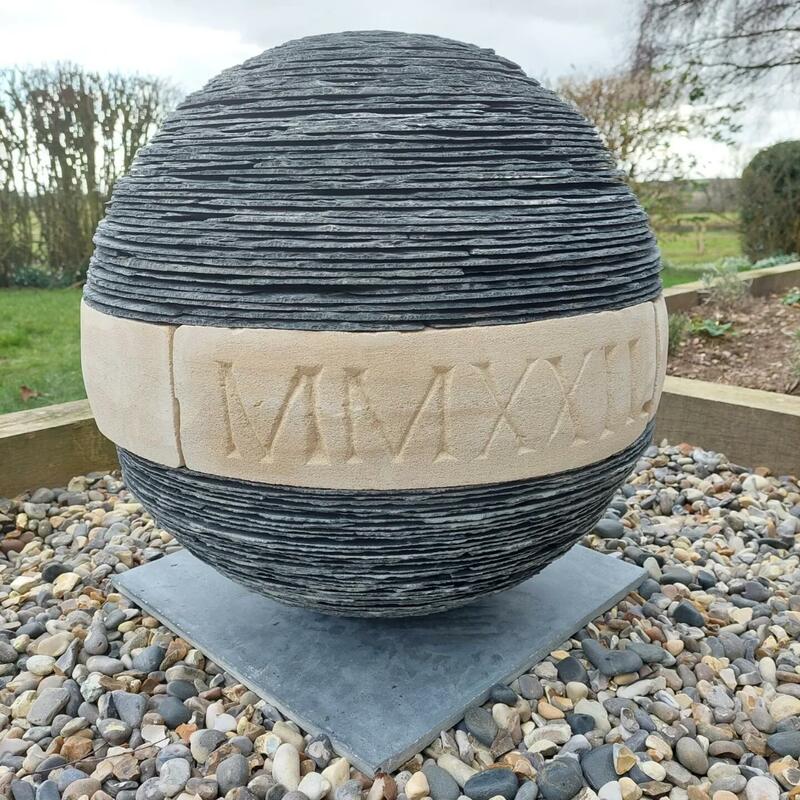 Rescued slate and limestone sphere