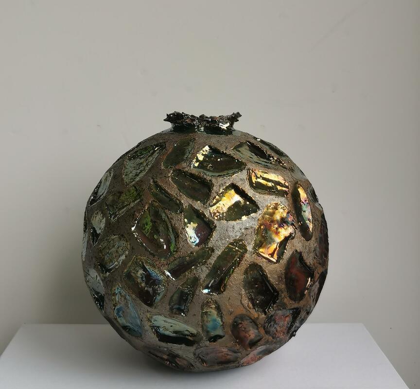 faceted copper spherical pot