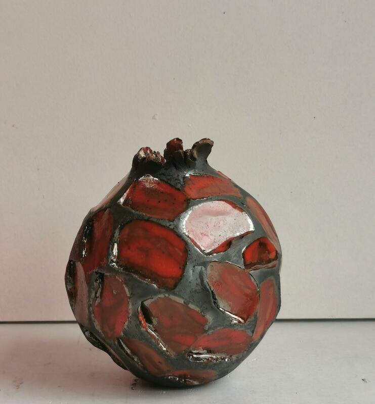 red faceted pot