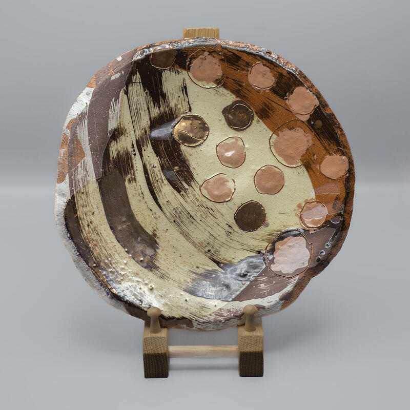 Medium dish with slips and lustre