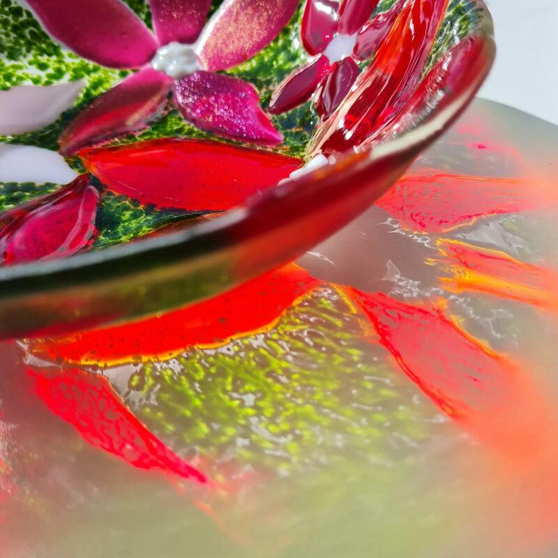 Red and pink flower bowl and reflection
