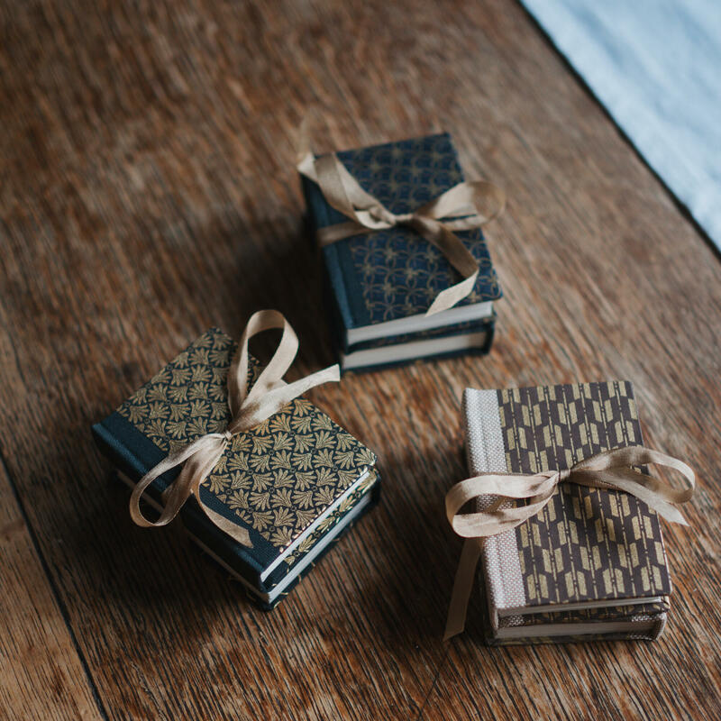 Miniature journal sets, £75