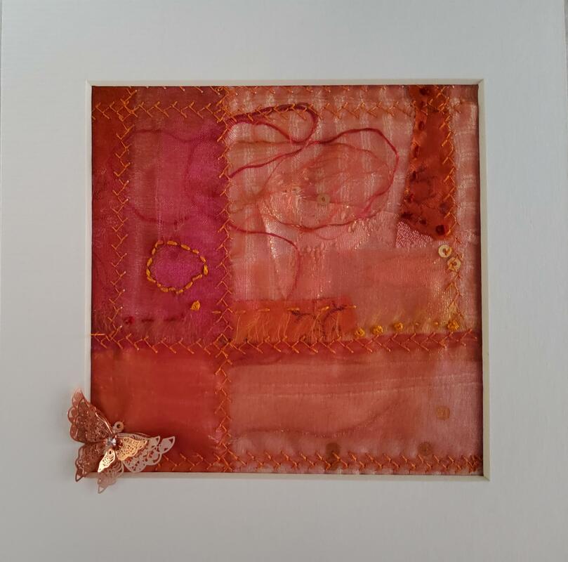 A Rosy Glow - layered lush fabric with hand and machine embroidery 18 x 18cm