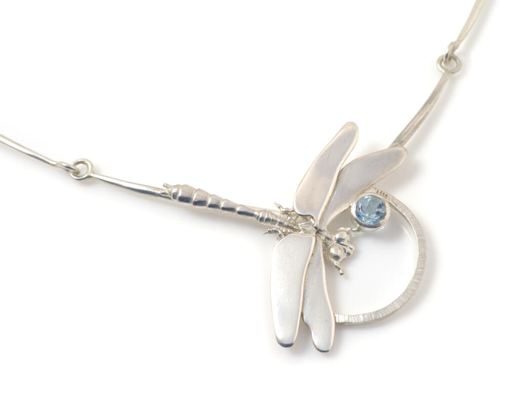 Silver dragonfly necklace with blue topaz