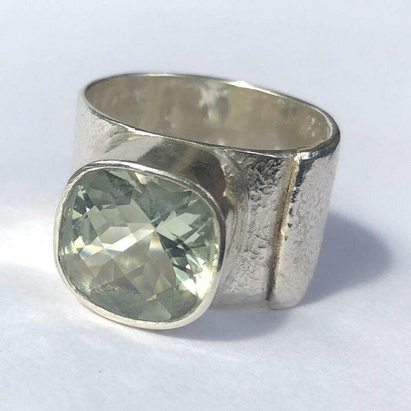 Silver ring with green quartz
