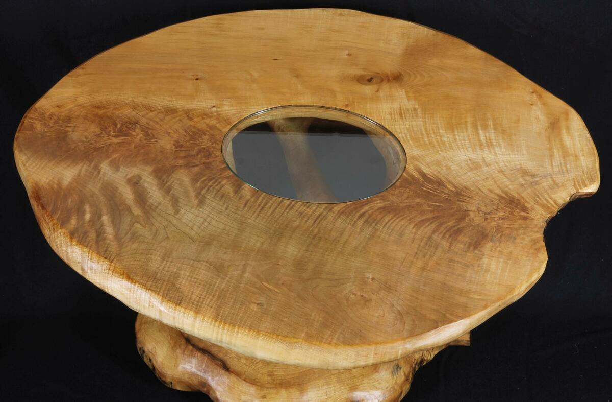 Heart-shaped sycamore tree-table top illustrating the grain and character of sycamore wood