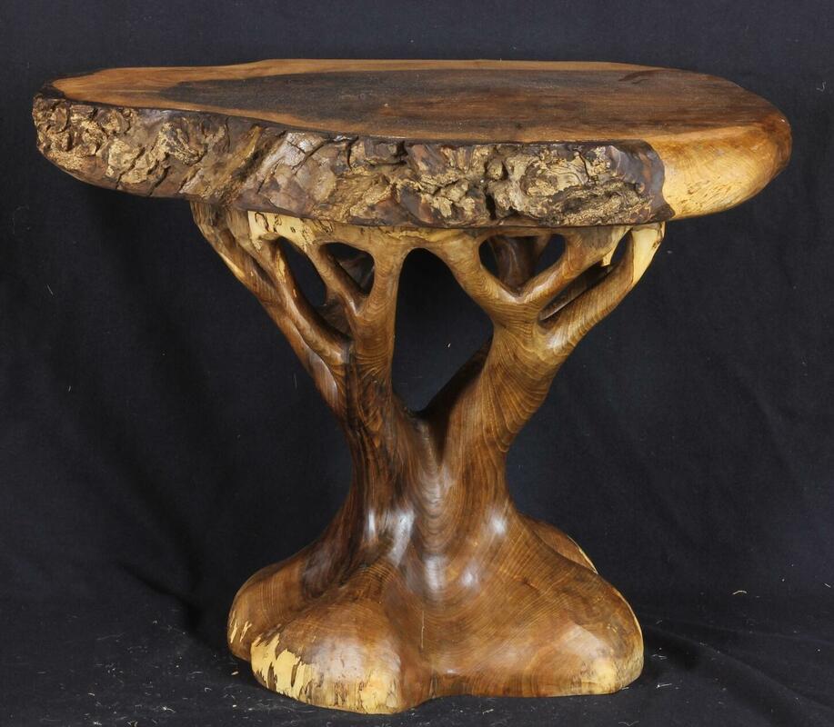 Walnut tree-table hand-carved from the wood of a walnut tree