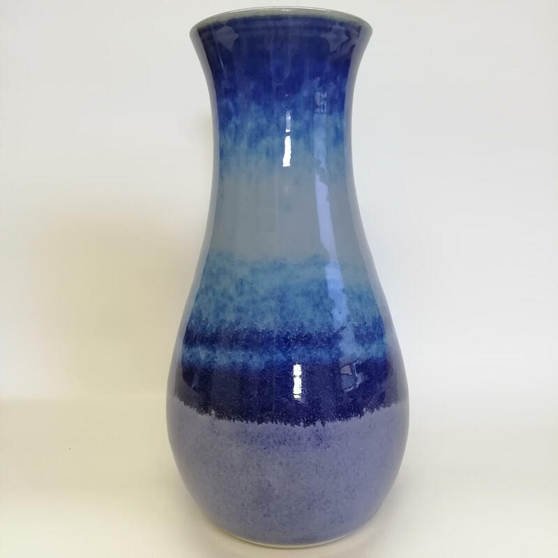 Tall vase, blue glaze with overglaze
