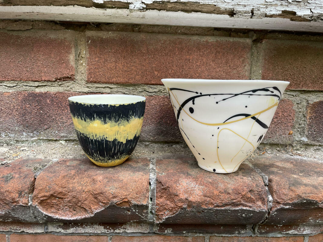 Bumblebee vessels, yellow and black, parian porcelain