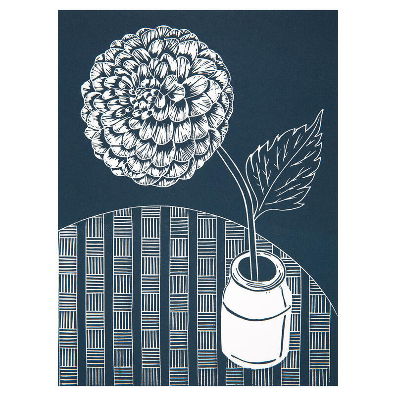 A dahlia in a pot on a table - Lino Lord