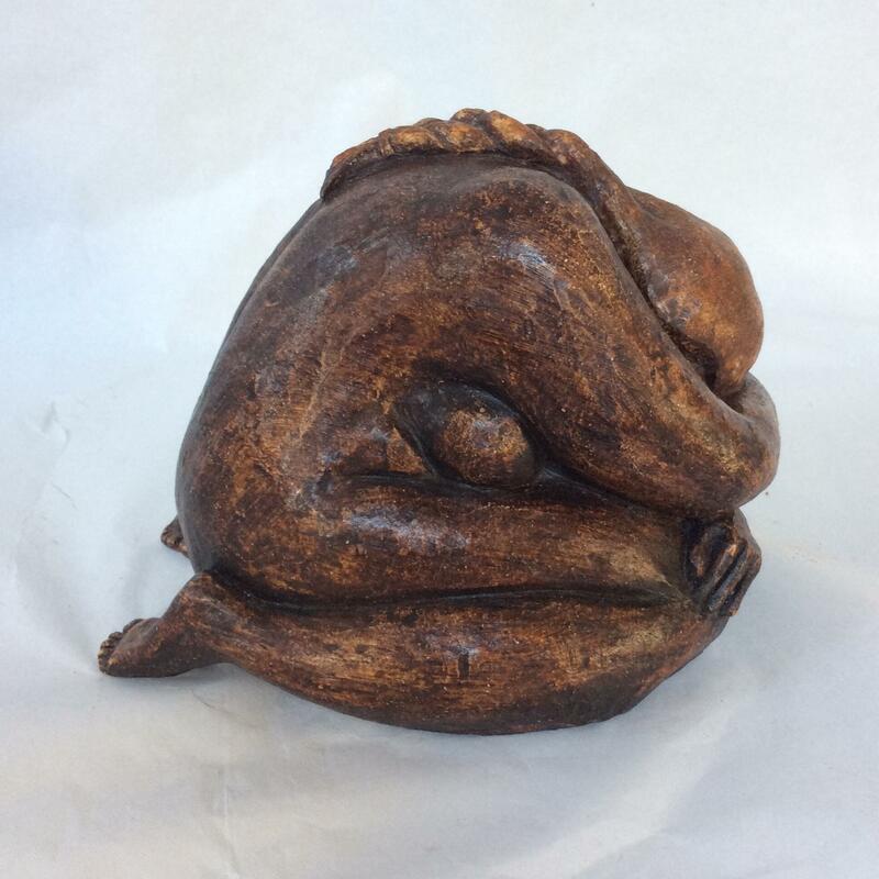 Curled up figure - clay fired to stoneware