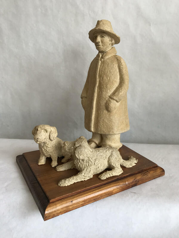 Man with his dogs - clay fired to stoneware
