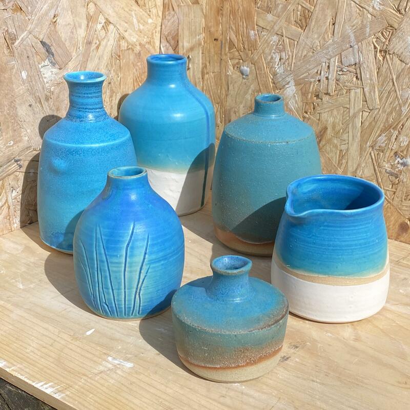 bottles and jug in sky blue