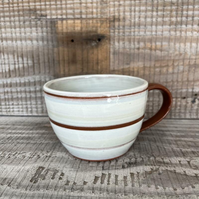 Slip decorated earthenware mug