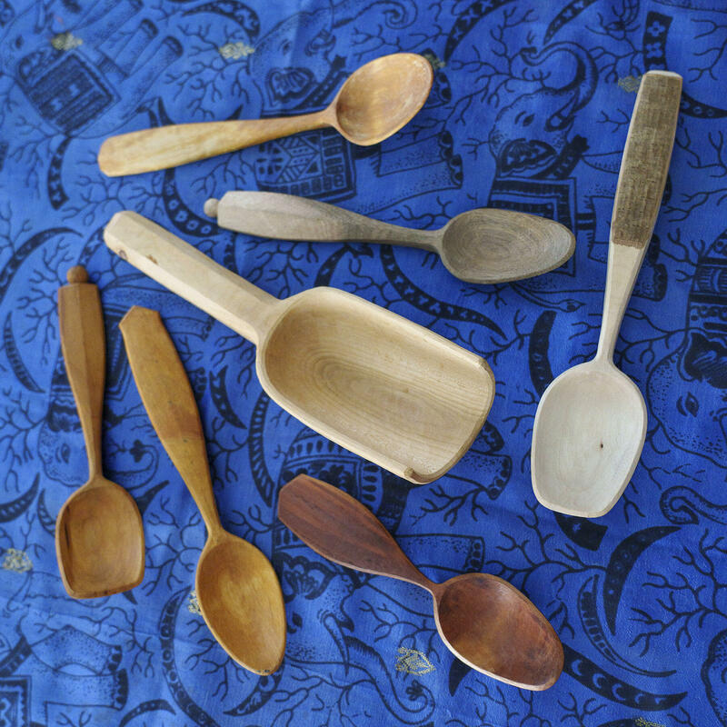 A selection of hand-carved wooden spoons (and a scoop) by Michael J. Amphlett