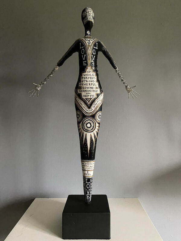 Painted plaster and wire figure
