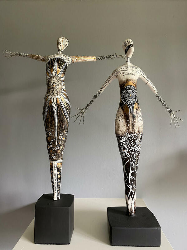 Painted plaster and wire figures