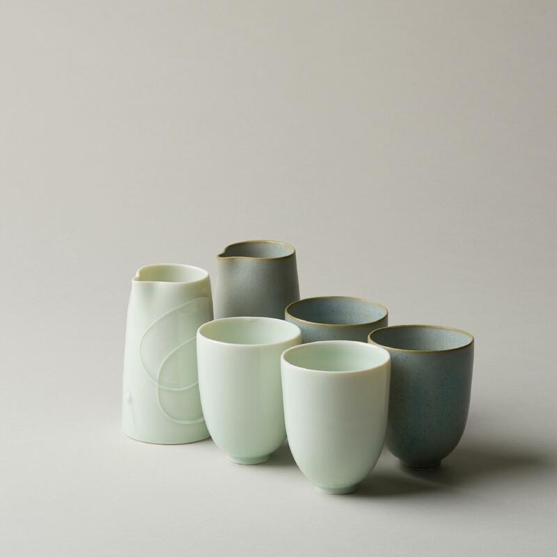 porcelain cups and pourers