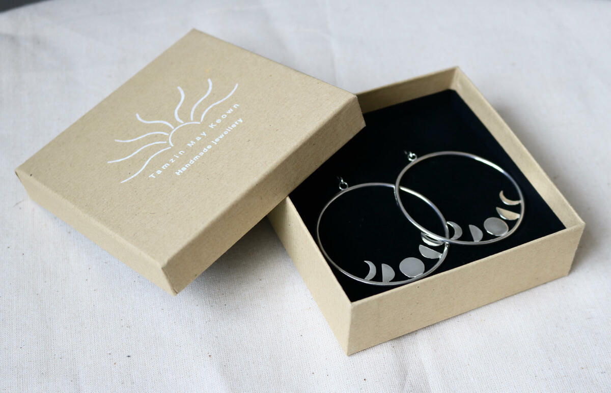 Sterling silver moon earrings with recycled packaging 