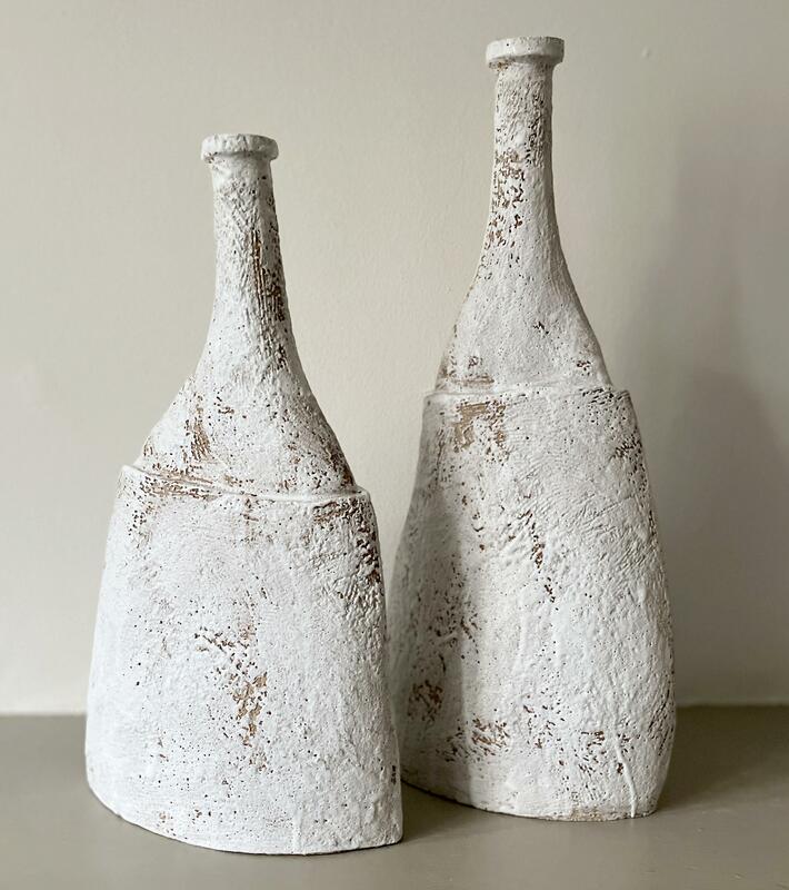 Stoneware coiled bottles.