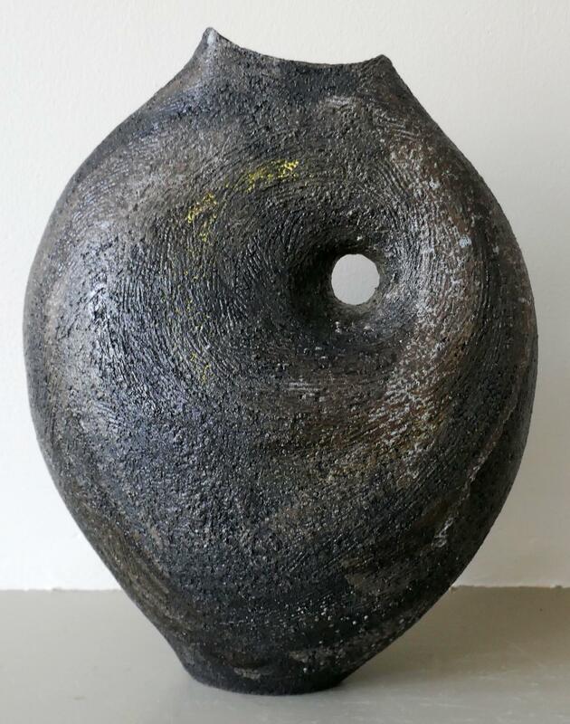 Coiled stoneware vessel with eye.