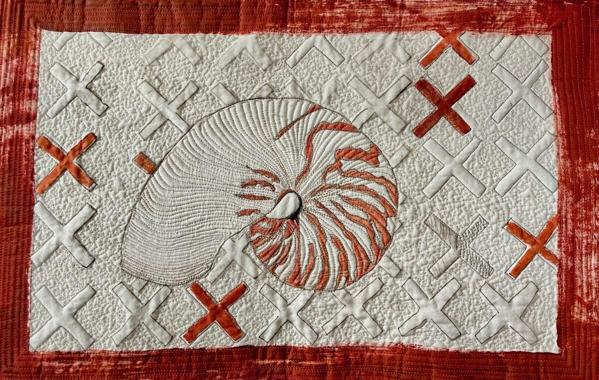 Nautilus Shell  56cm x 38cm, monoprinted, hand painted, onto dyed cloth, with hand and machine stitch quilting, with hanging sleeve    £120