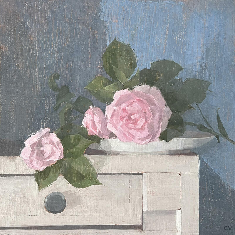 Hybrid, an oil painting by Claire Venables. This quiet painting shows some pink roses laying on top of an old chest of drawers.