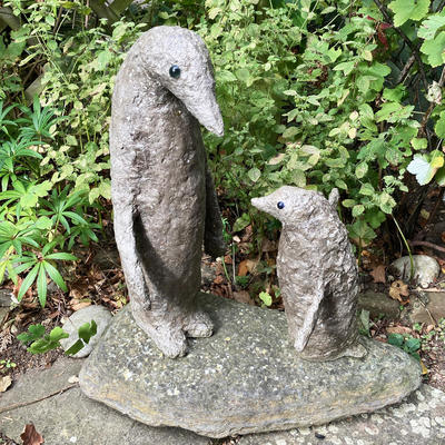 Penguin Pair. Ciment Fondu on a river-stone. 35 cm approx high. £450