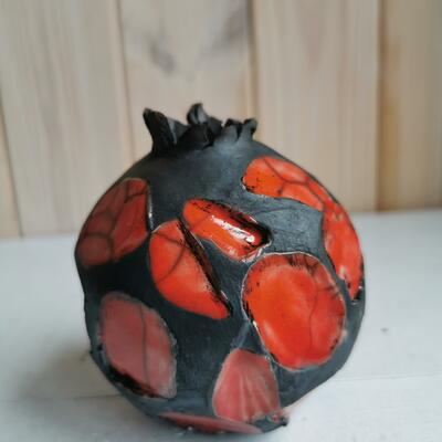 Red & black spherical vessel