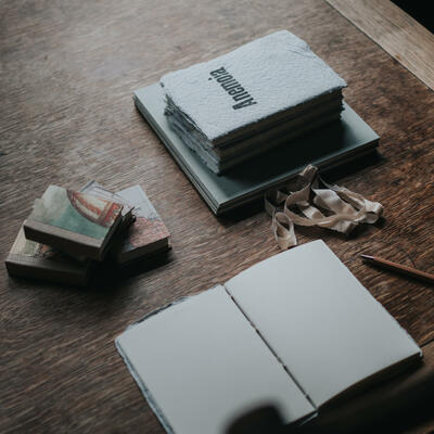 Handmade notebooks on a wooden table