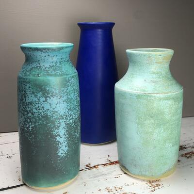 Three  wheel thrown stoneware vases in satin ,mid fire range glazes.