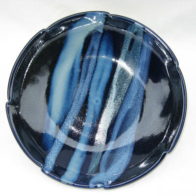 Serving platter: dark blue glaze with pours. D. 26cm, £50.00