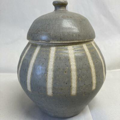 Wheel thrown stoneware lidded jar, glazed resist striped 