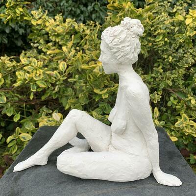 Clay sculpture - woman sitting