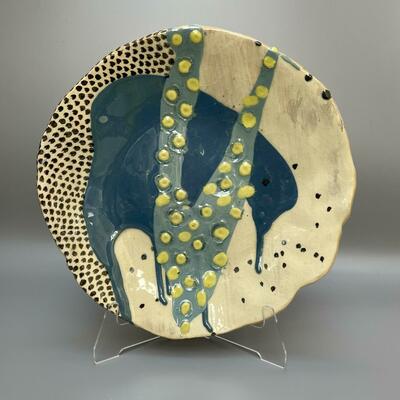 Dish with blue slip and gold and sliver lustre