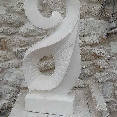 Doodle and is carved from Limestone